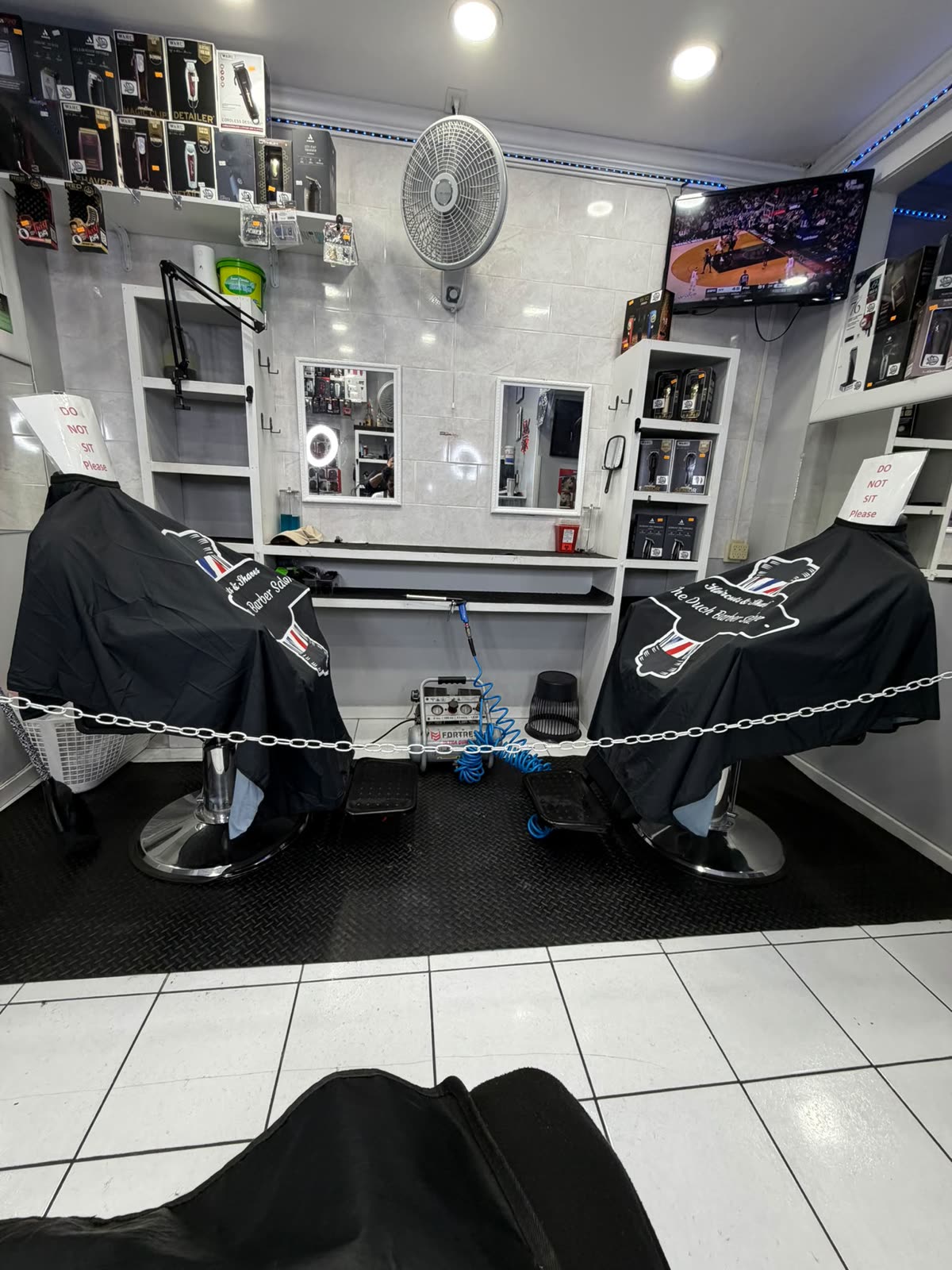 Two fully equipped barber stations ready for booth rental